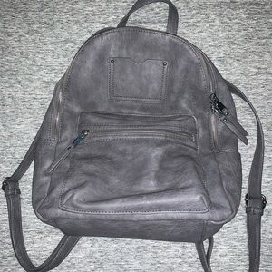Gently Used Gray Backpack with Adjustable straps.